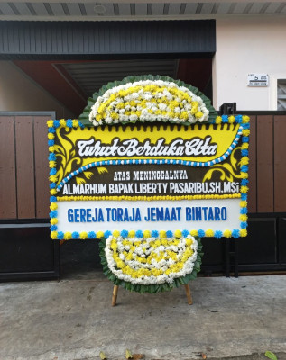 Papan Bunga Duka di Indihiang